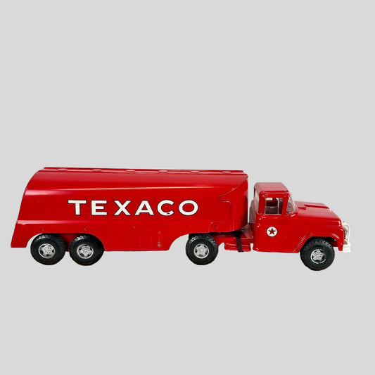 Red Texaco truck model on a white background