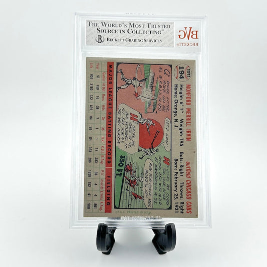 Vintage baseball trading card in a protective frame with grading information.