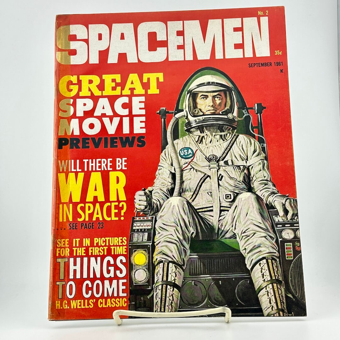 Vintage magazine cover featuring an astronaut with text about space movies and war in space.