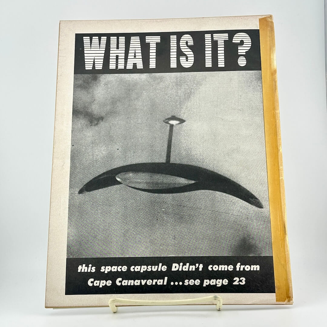 Vintage magazine cover with a space capsule illustration and text on a white background