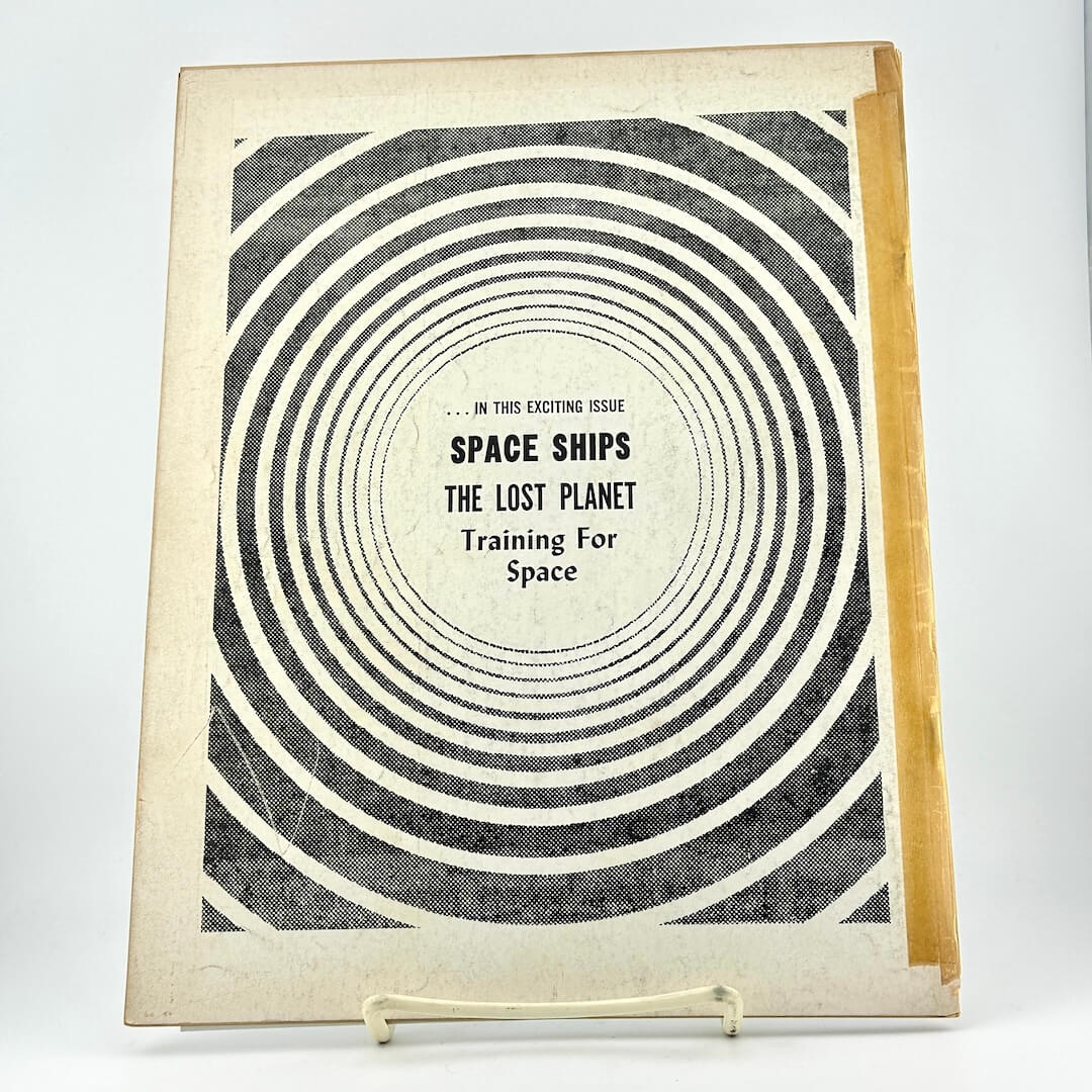 Vintage-style magazine cover with concentric circles and text on a white background