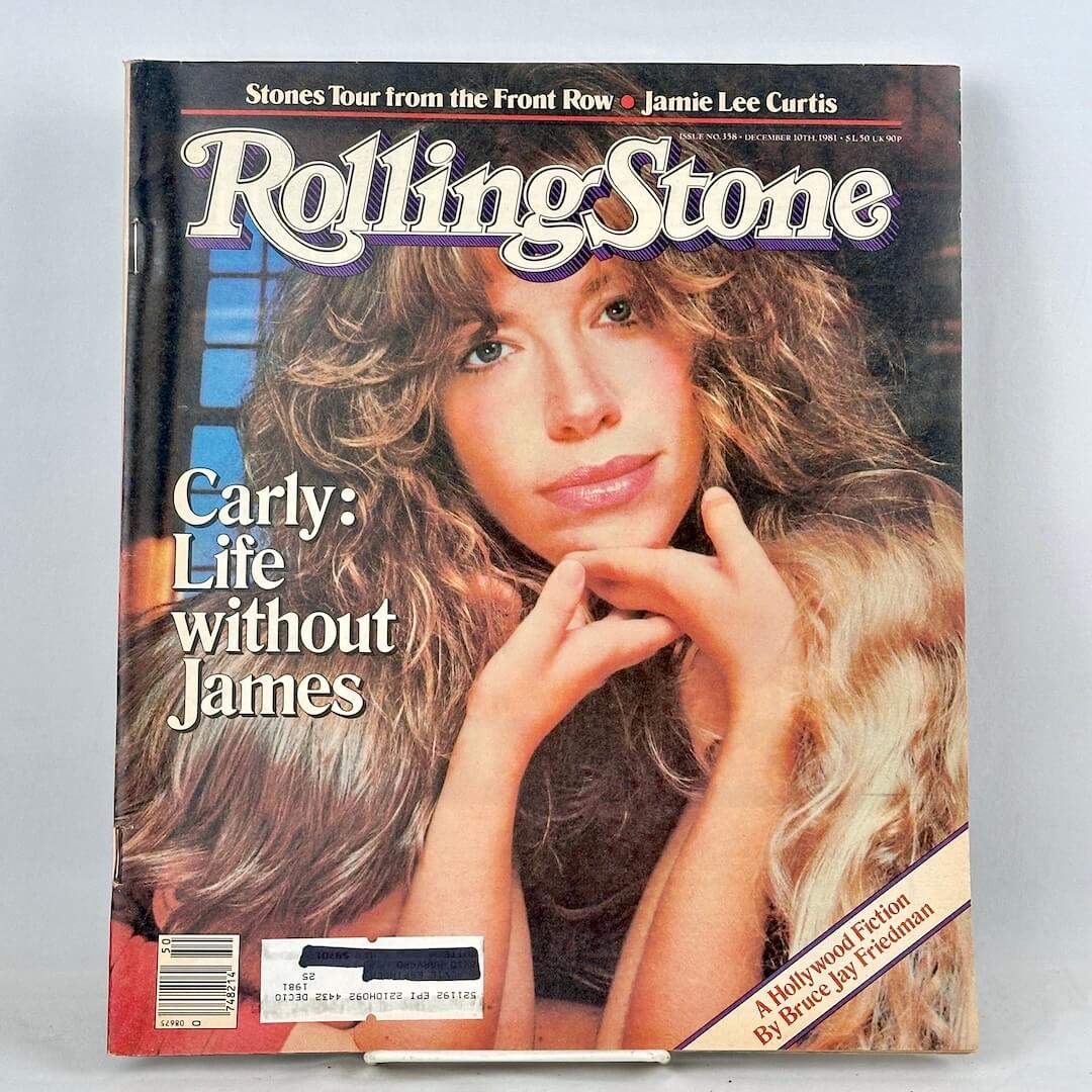 A vintage issue of Rolling Stone magazine cover featuring a close-up portrait of Carly Simon.