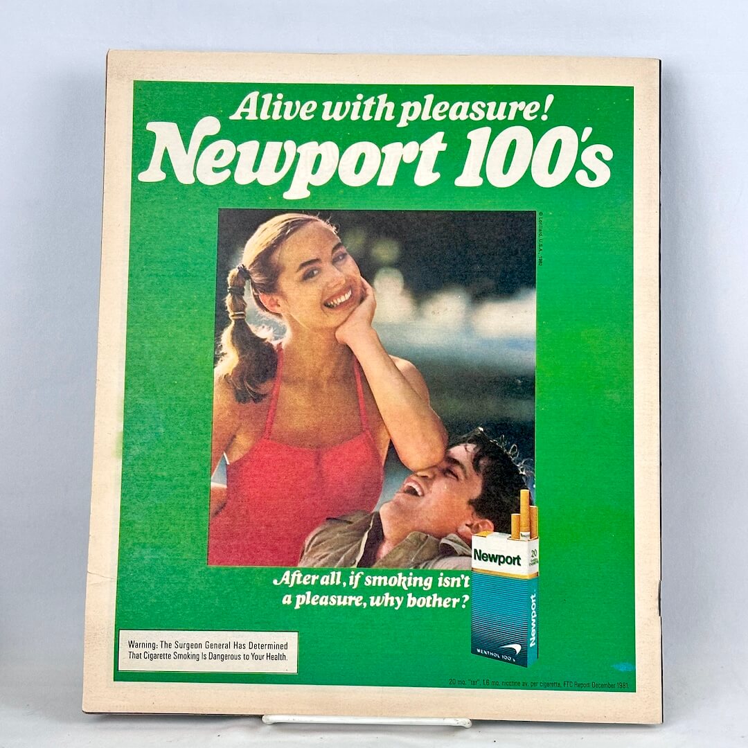 Vintage Newport 100s cigarette advertisement on back cover of magazine.