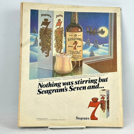 Back cover of magazine with full page ad for Seagram's 7 featuring winter scenery behind liquor bottle.