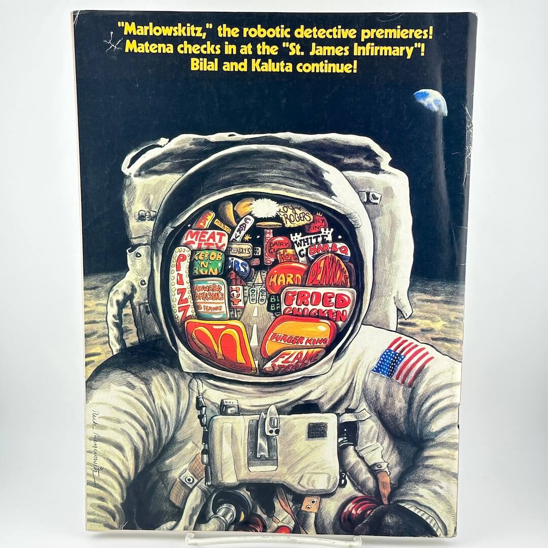 Back cover of magazine with illustration of astronaut on moon with neon signs reflected in visor.