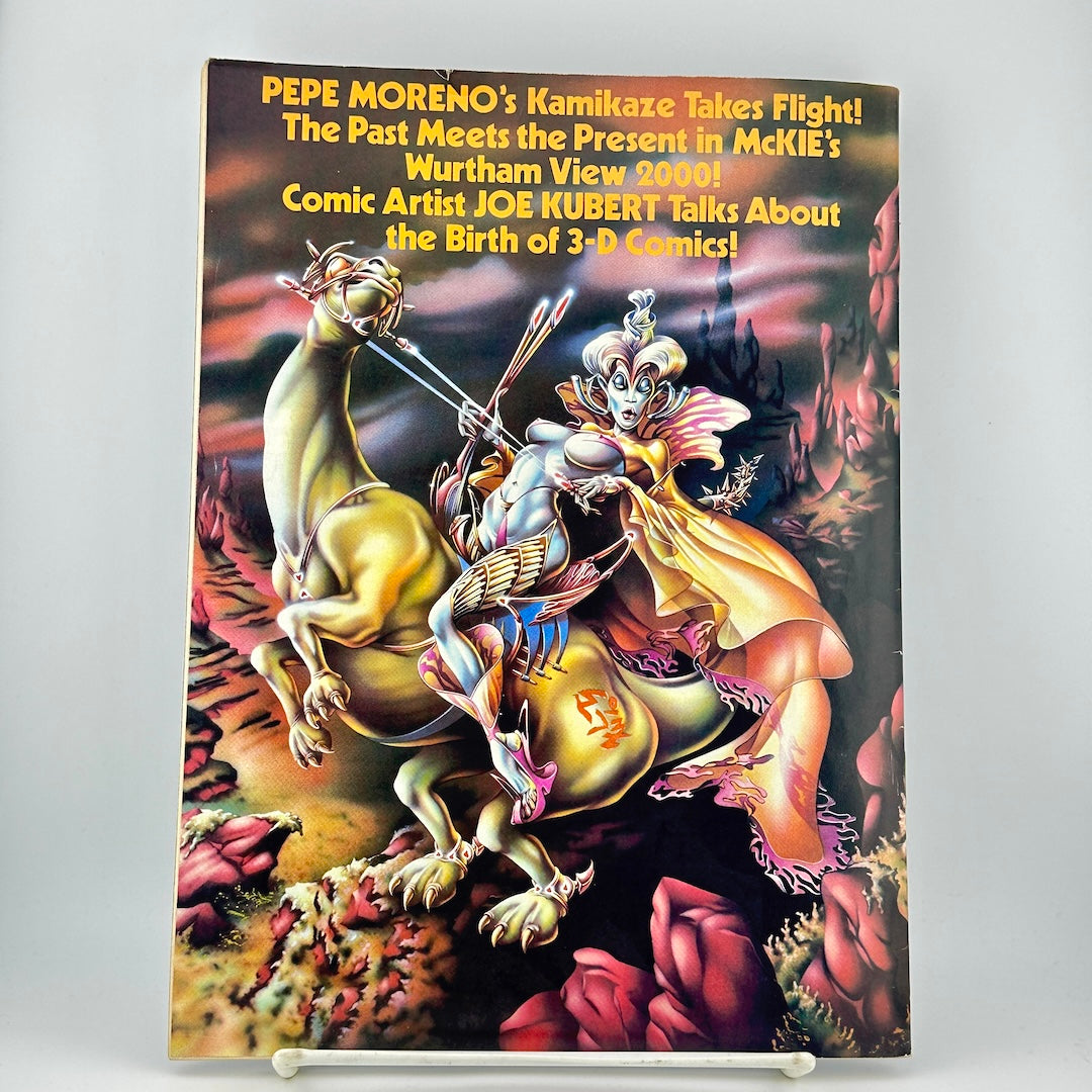 Back cover of magazine featuring a fantasy illustration of a winged figure riding a golden creature in a dark, dramatic scene.