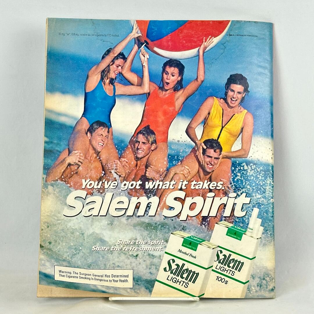 Back cover of magazine with full page ad for Salem Light Cigarettes featuring six people at the beach.