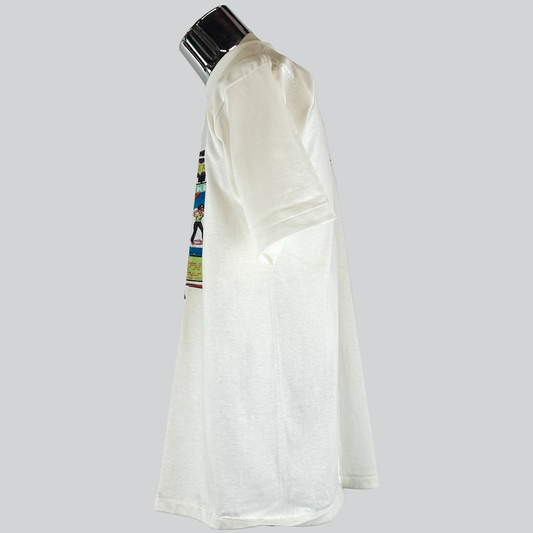 Side view  of a white Pearl Jam t-shirt.