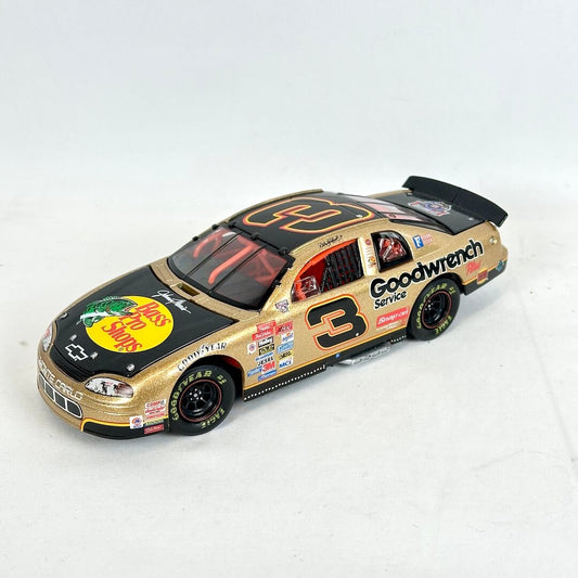 Model race car with multiple sponsor logos on a white background