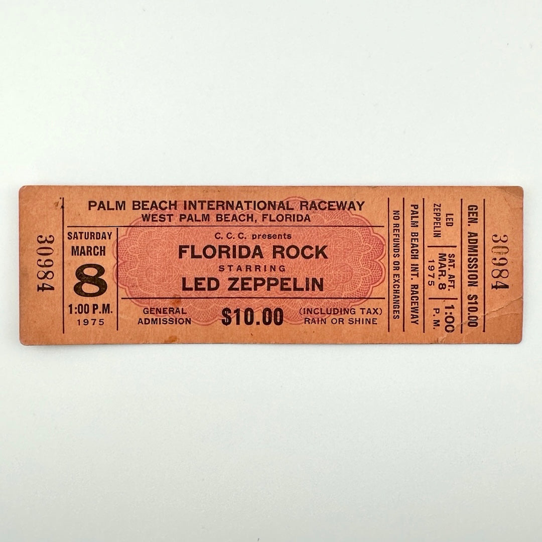 Orange rectangular concert ticket #30984 with black print for Florida Rock starring Led Zeppelin in Florida in 1975.