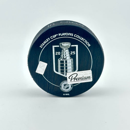 Hockey puck with Stanley Cup Playoffs Collection branding on a white background