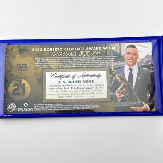 Certificate of Authenticity of bank note with image of Judge accepting award.
