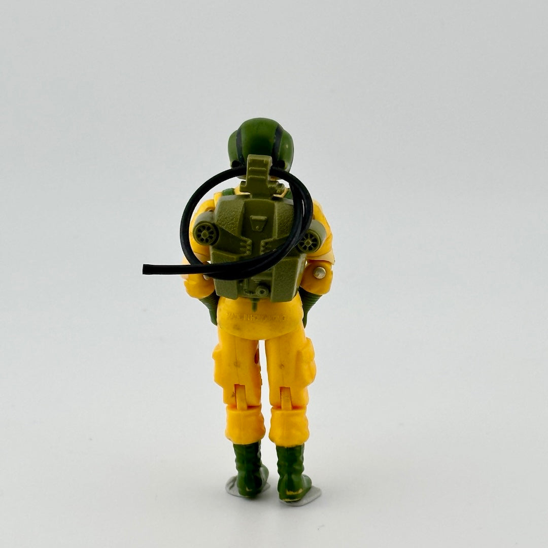 Action figure in yellow wetsuit with olive green accents, like shoes, gloves, harness, helmet, etc.