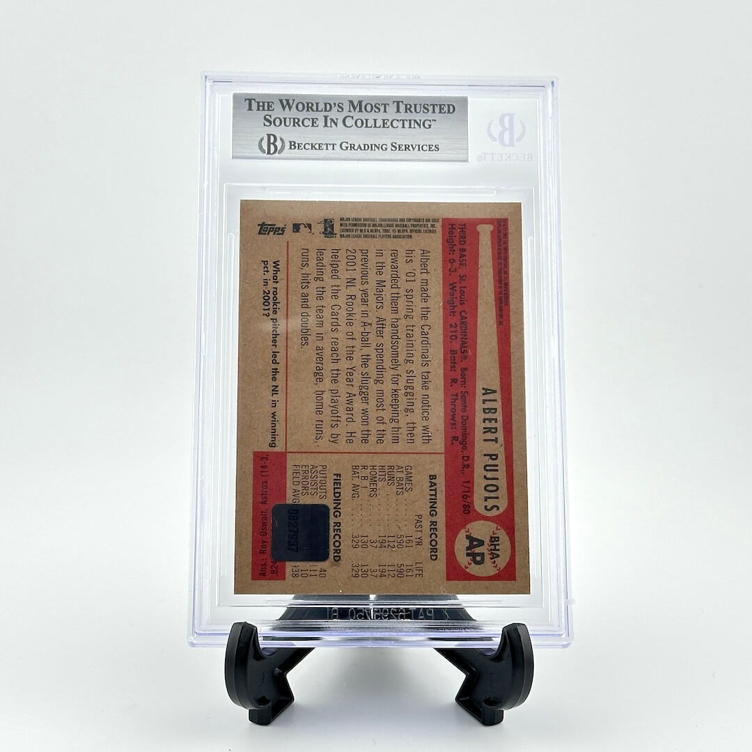 Baseball card in a clear protective case with a white background