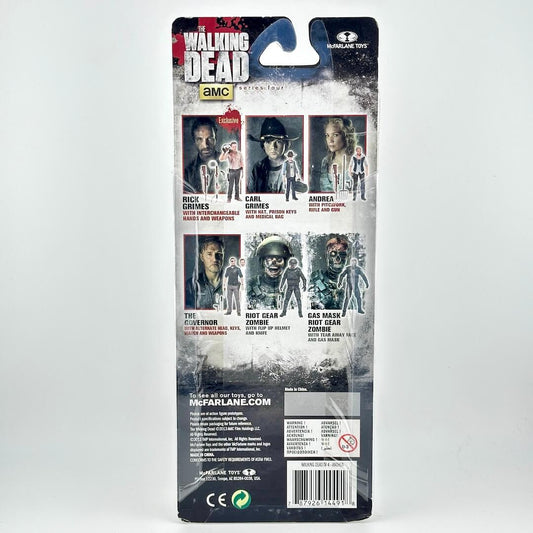 Back packaging of a McFarlane Toys Walking Dead collectible figure, featuring character artwork and product details.