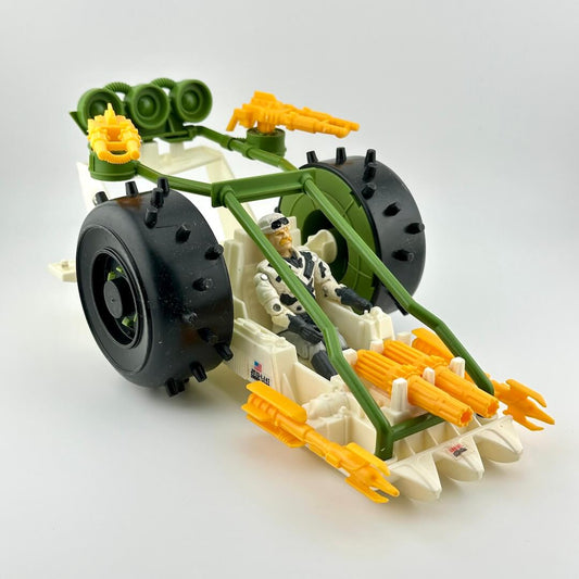 Toy model of a vehicle with green, yellow, and black colors on a white background