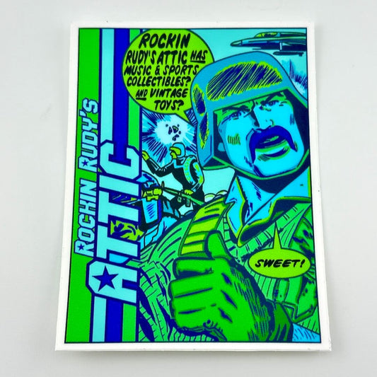 Sticker featuring G.I. Joe imagery in blue and greens against light gray background.