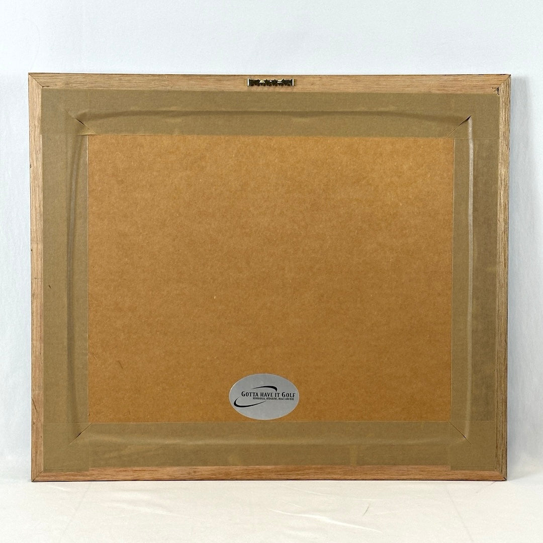 Backside of frame showing company that produced the photo and framed it.