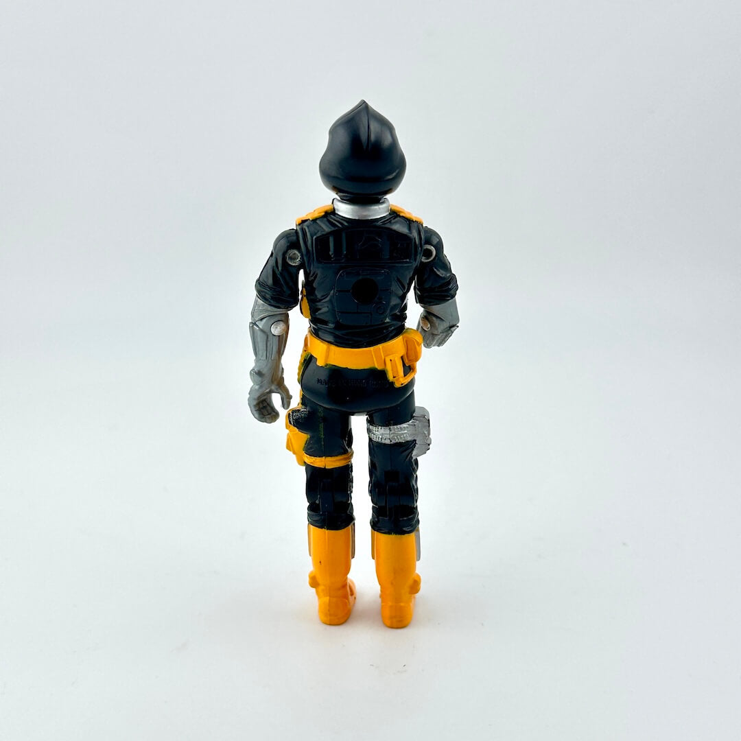 Toy figure with black and yellow outfit on a white background