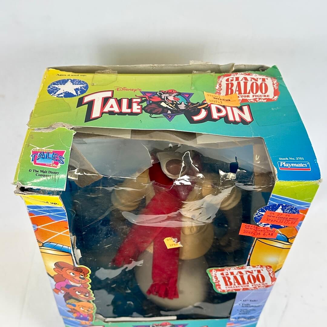 Toy figure of Baloo from 'The Jungle Book' in packaging with colorful graphics