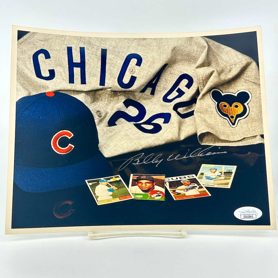 Photograph of memorabilia collage featuring signature of player, JSA authentication sticker in corner.