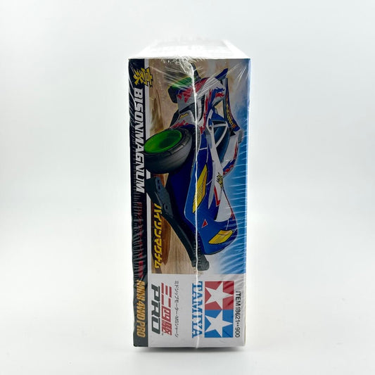 Side view of packaging showing same image on the front of blue, white, and yellow racing car.