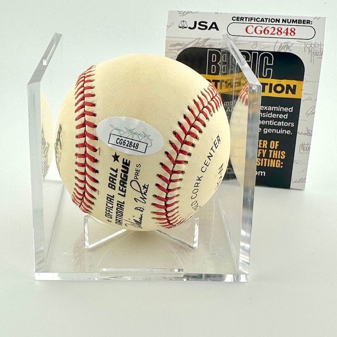 Signed baseball in clear display cube with JSA sticker and card certificate