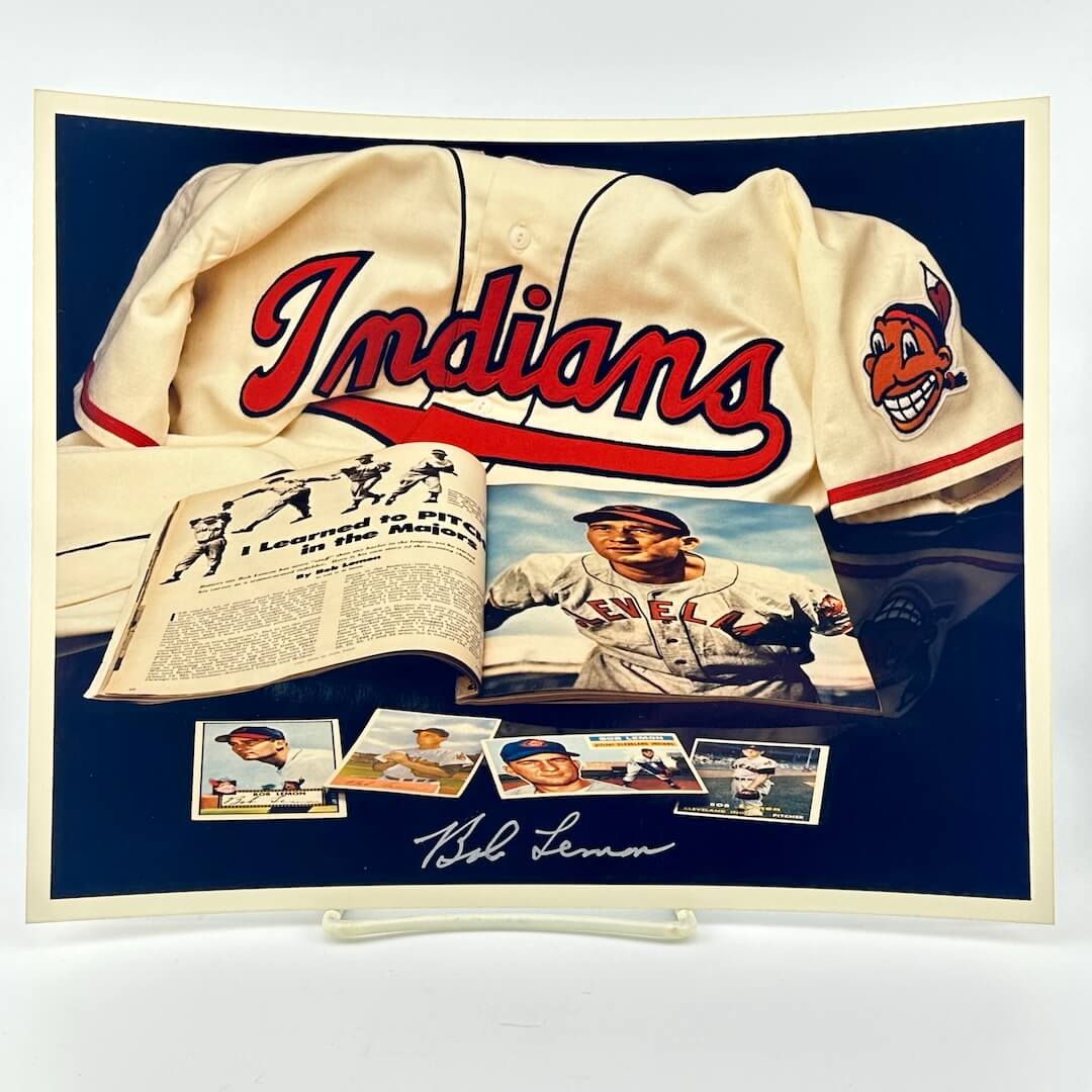 Photo of arranged baseball memorabilia featuring Bob Lemon and his signature.