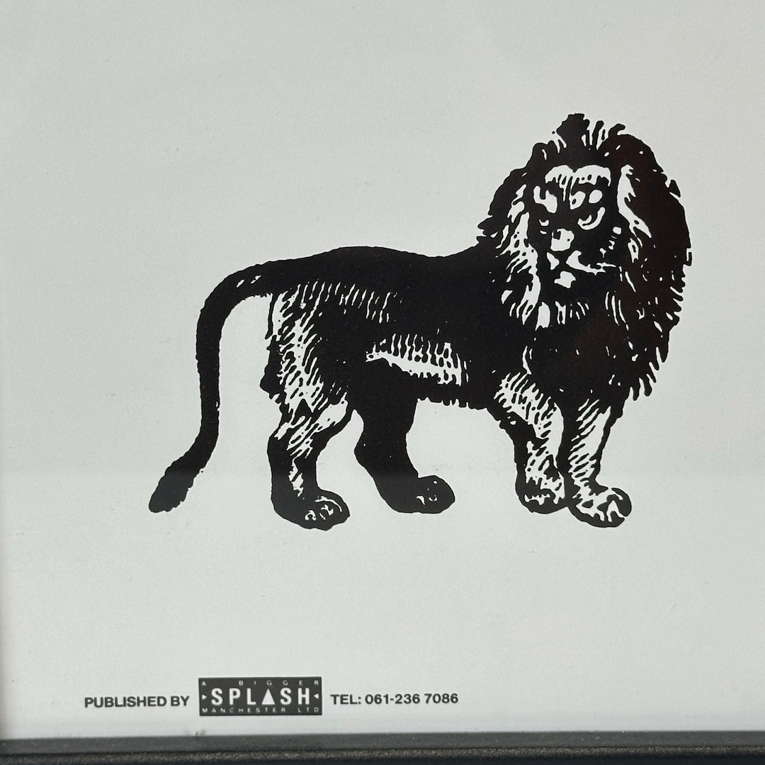 Close up of bottom left corner with Lion logo above Splash publishing logo & info.