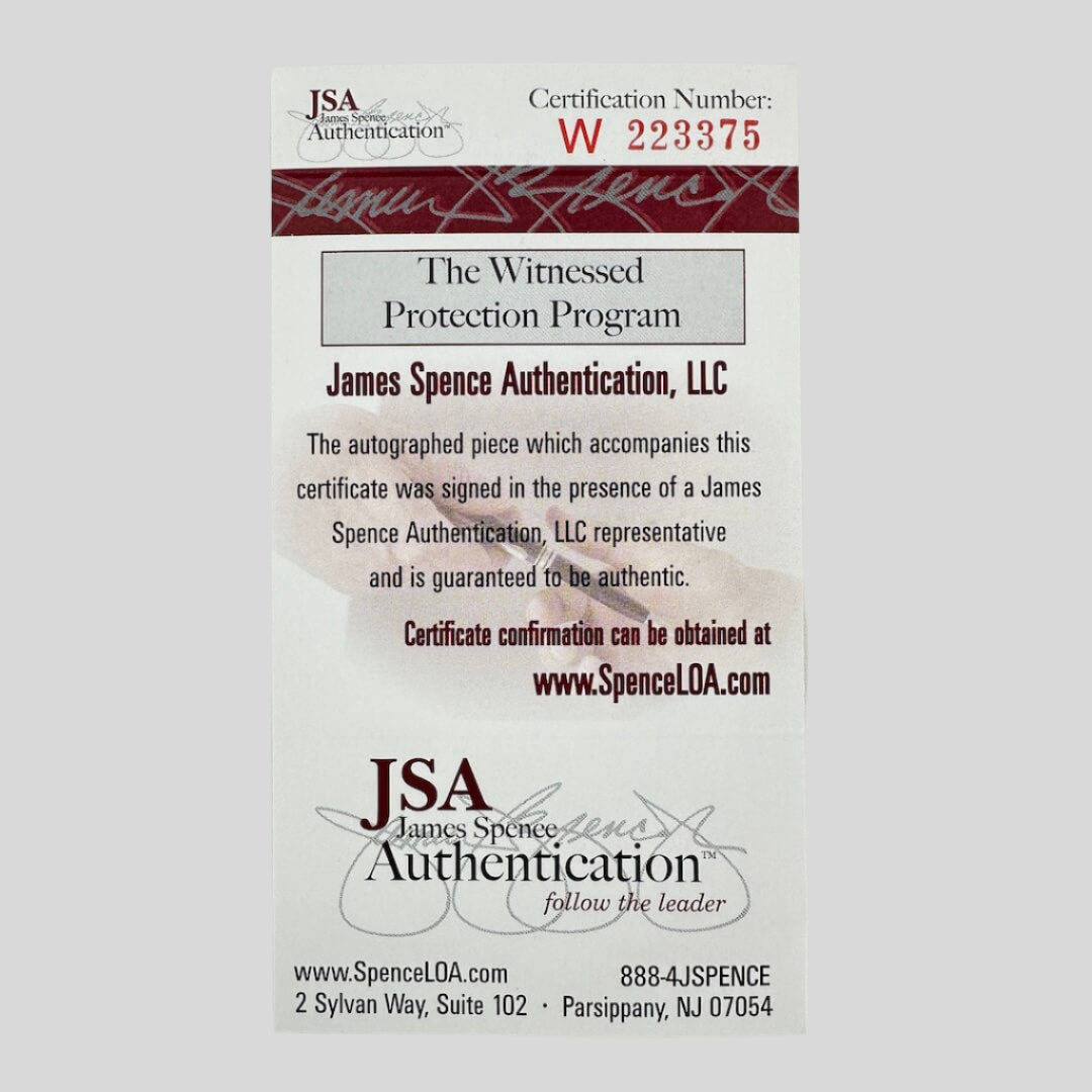 James Spence Authentication certificate on a gray background