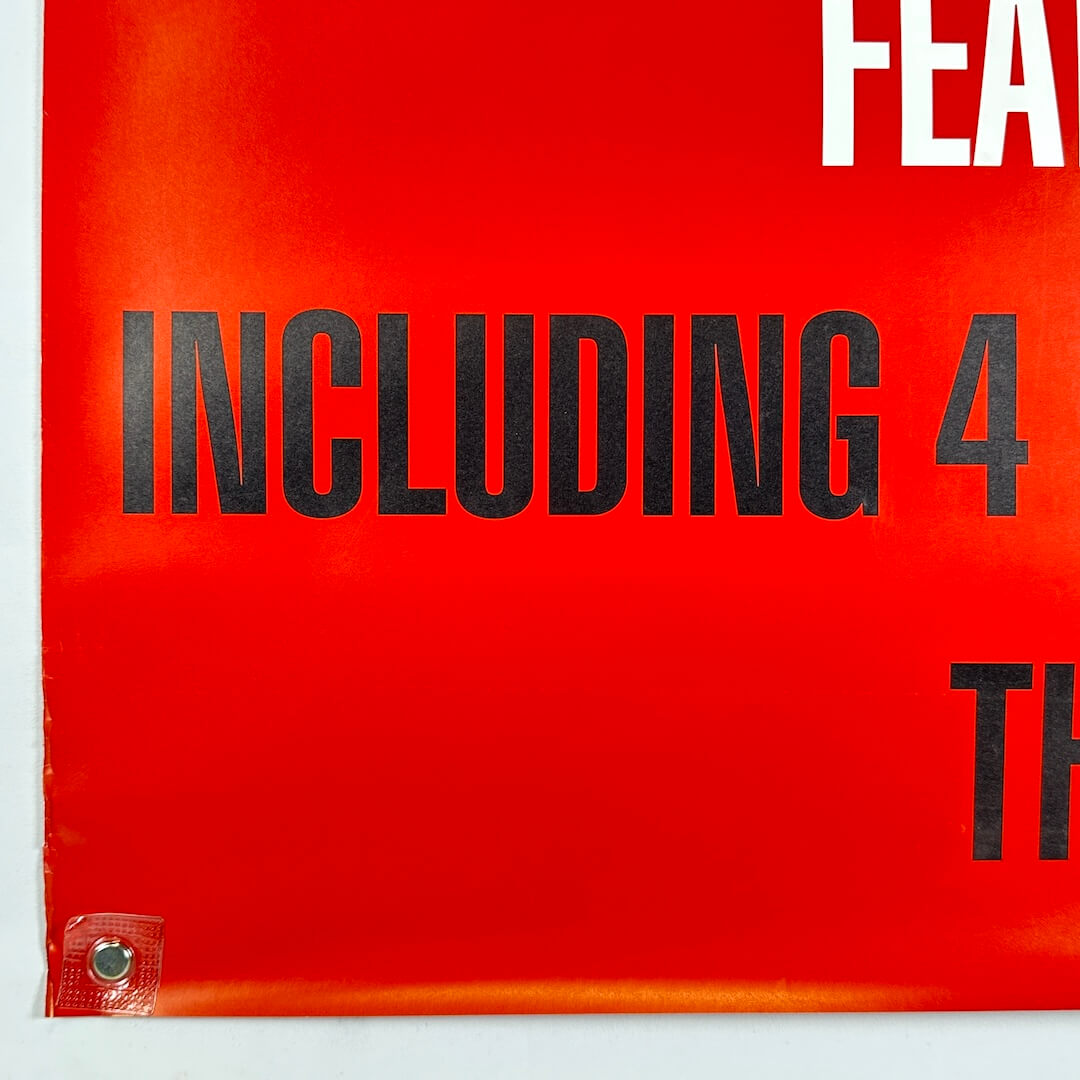Bottom left corner of poster with wear to left edge.