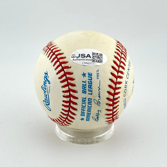 Baseball with Rawlings logo and JSA authentication label on a white background