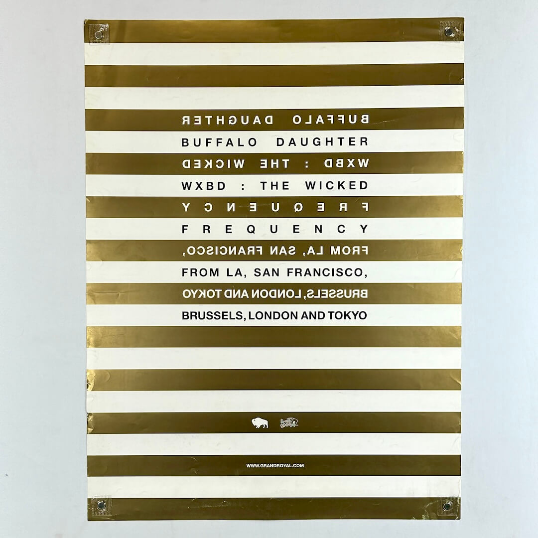 Gold and white striped poster with text in block in center on white background.