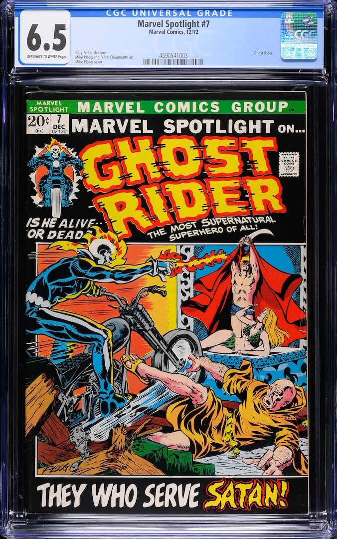 Plastic encased Ghost Rider comic with grading info banner along top. Main image is several fighting scenes.