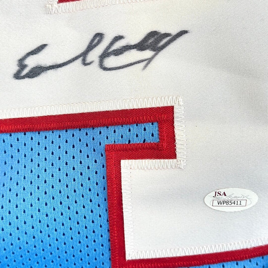 Close-up of signature and authentication sticker.