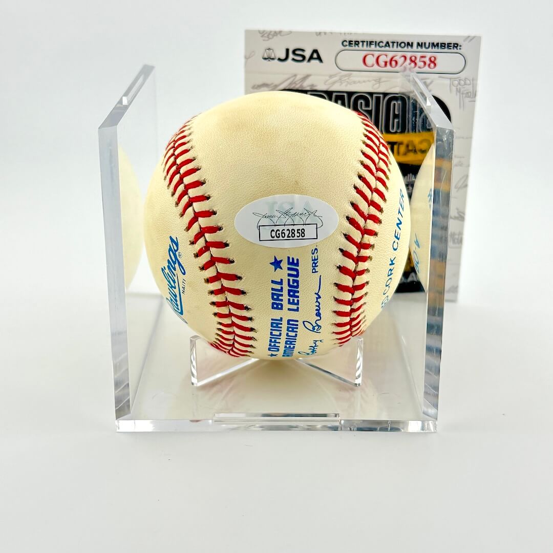 Baseball in a clear display case with certification number CG62858 on a white background