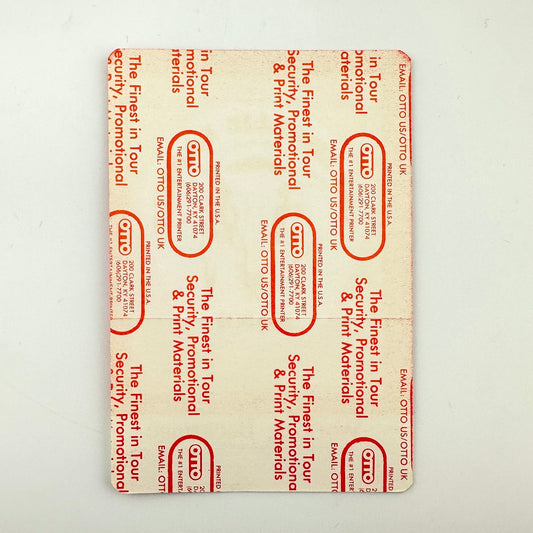 Backside of pass showing intact paper backing and mint condition.