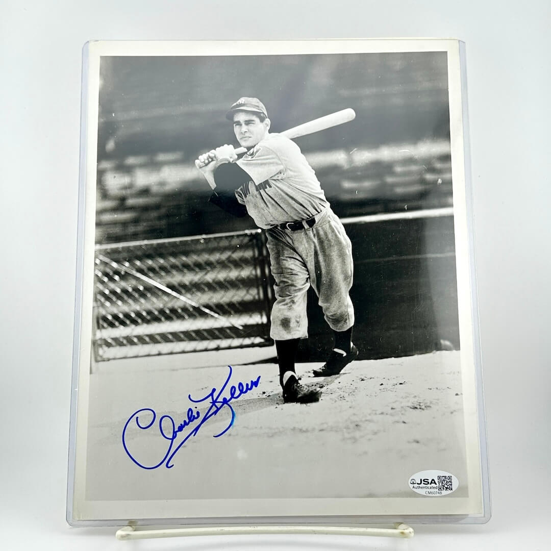 Vintage black and white photo of a baseball player holding a bat, signed by Charlie Keller with JSA authentication.