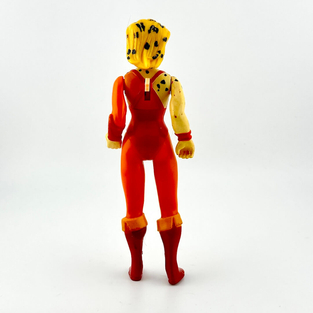 Action figure with a red and yellow outfit on a white background