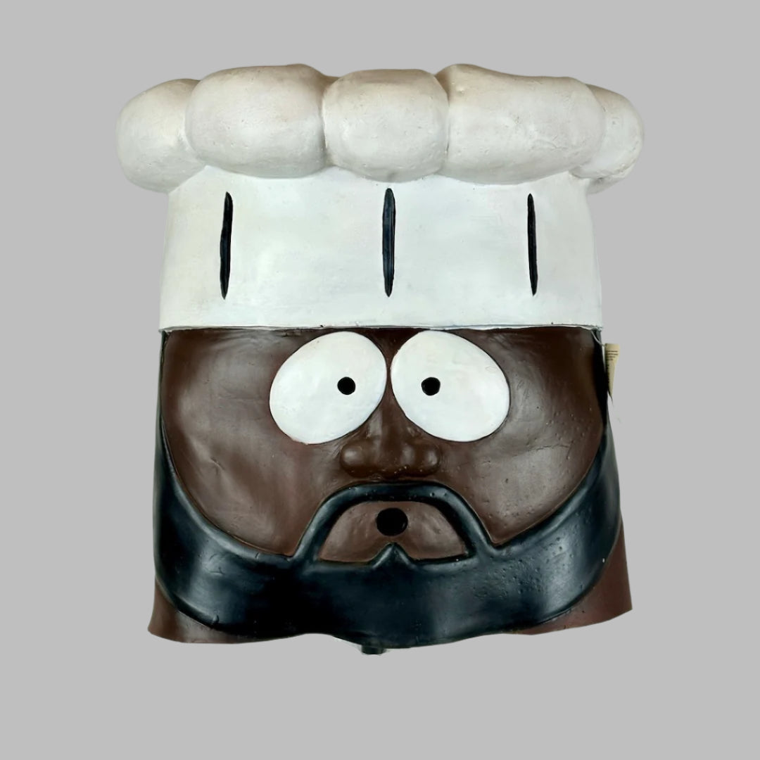 Front of mask showing Chef's surprised face, an opening for the mouth, and the original tag.