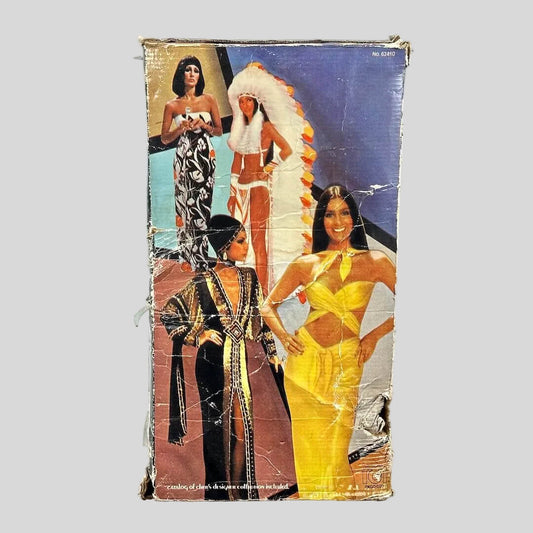Vintage packaging with images of women in different outfits on a white background