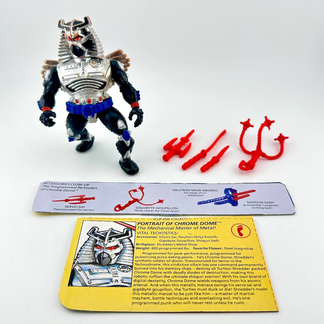 TMNT action figure with card back and accessories against white background.