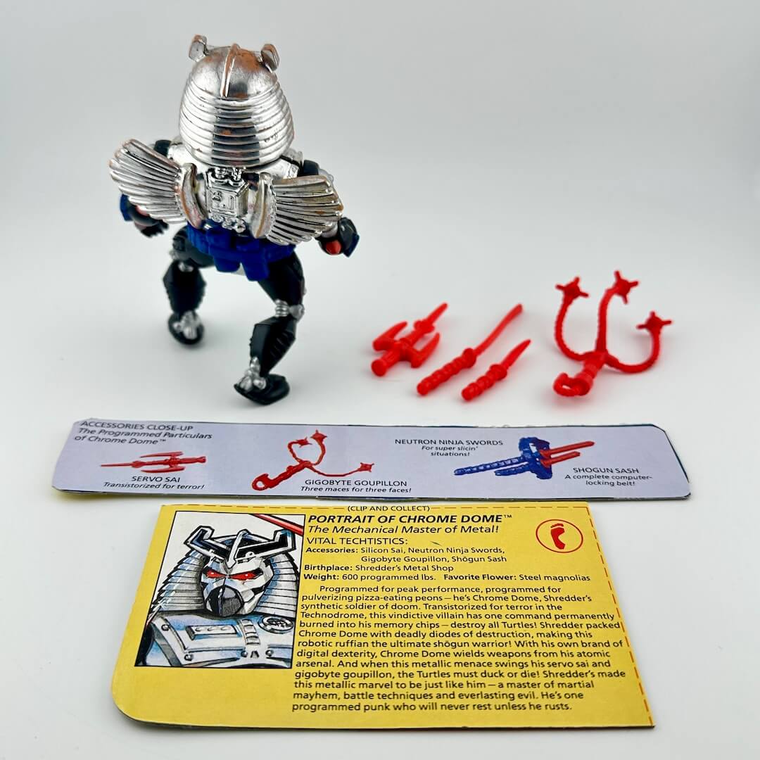 TMNT action figure with card back and accessories against white background.