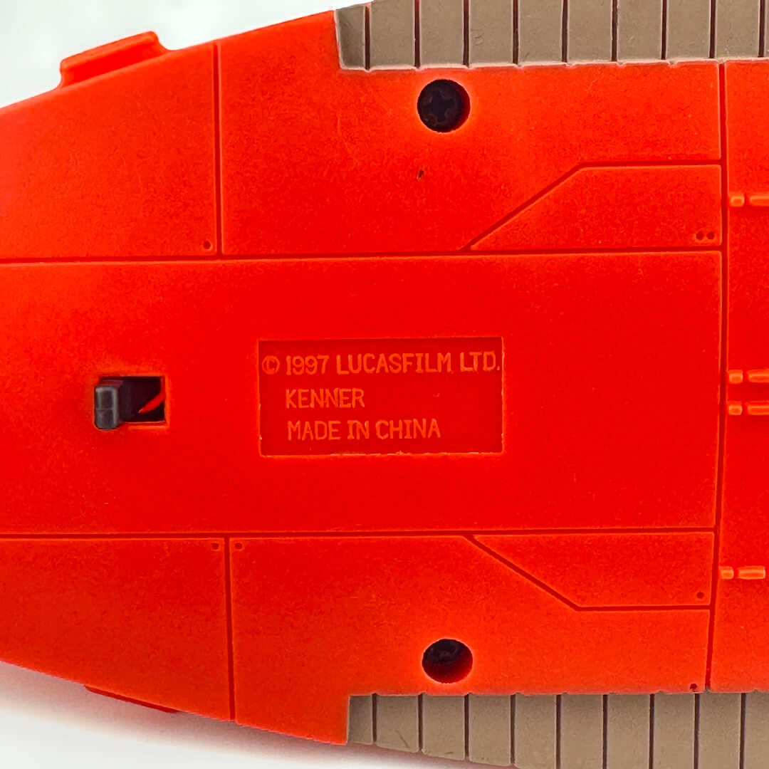 Underside of vehicle to show copyright and COO information embossed into plastic.