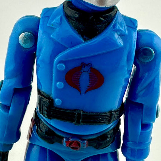 Blue action figure with a logo on a white background
