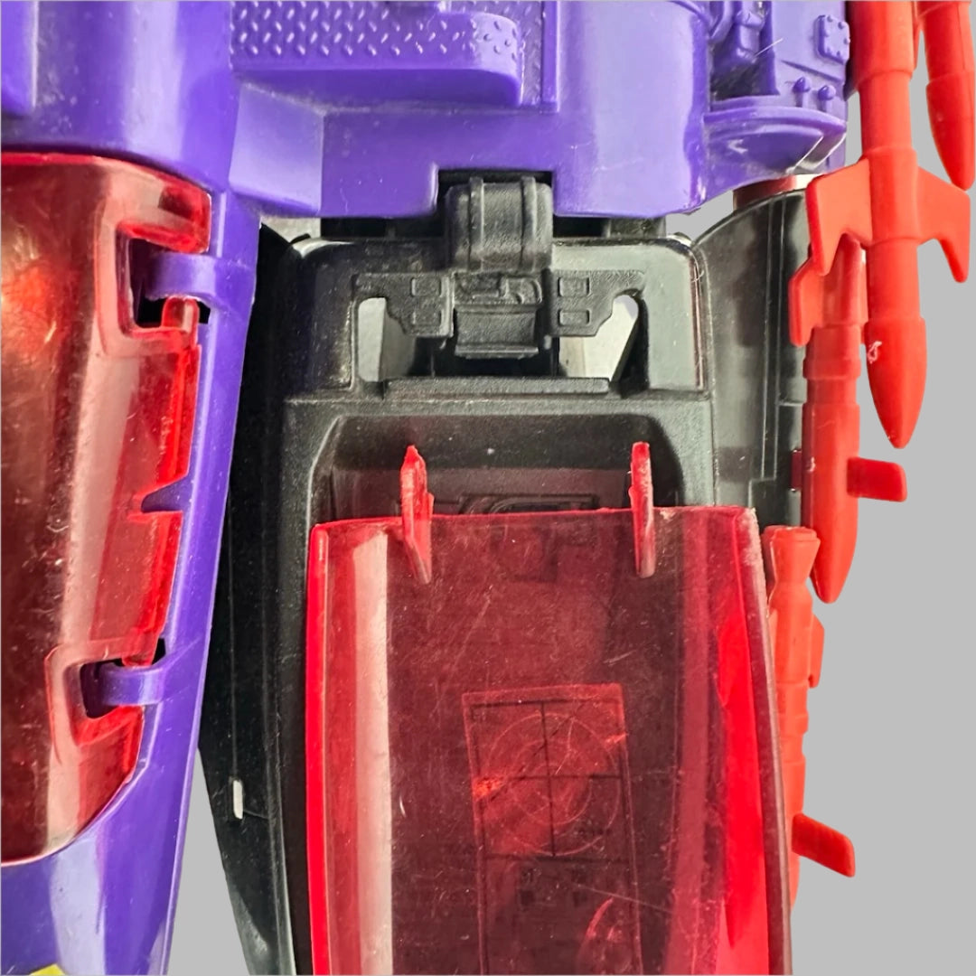 Close up on cockpit to show broken windshield attachments.