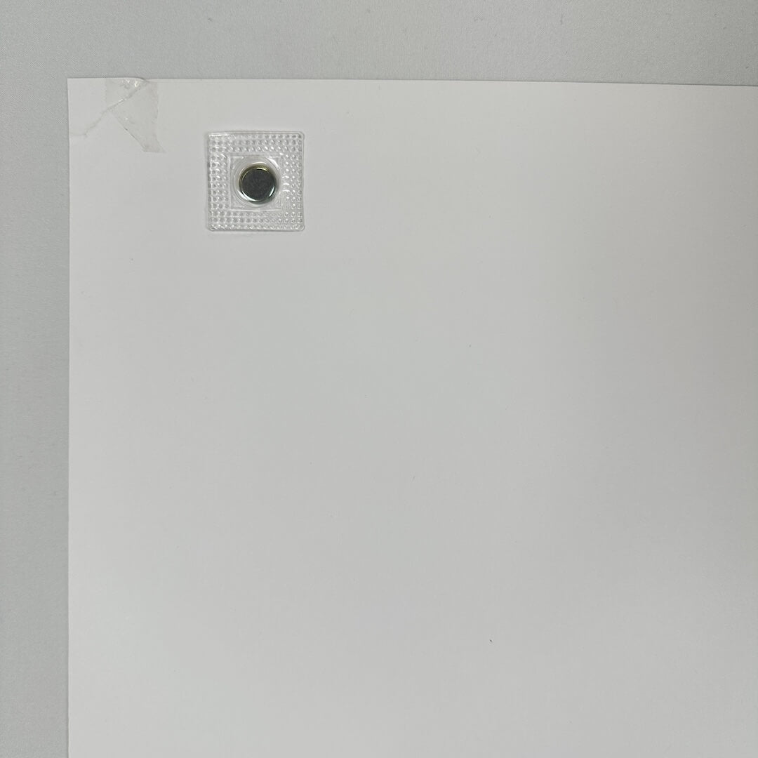 Backside of corner that's been repaired with tape showing no other damage.