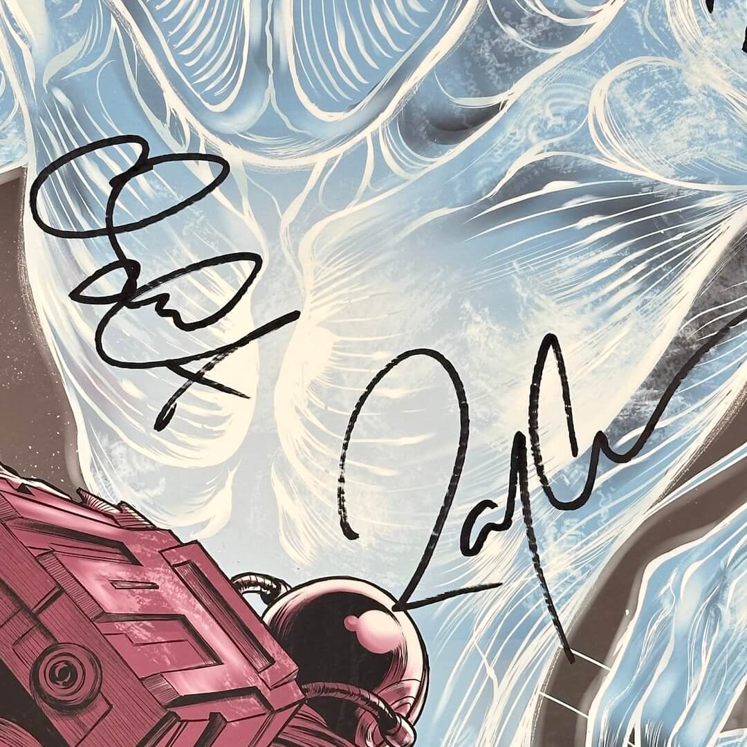 close up of two marker signatures on front of poster at center of poster.