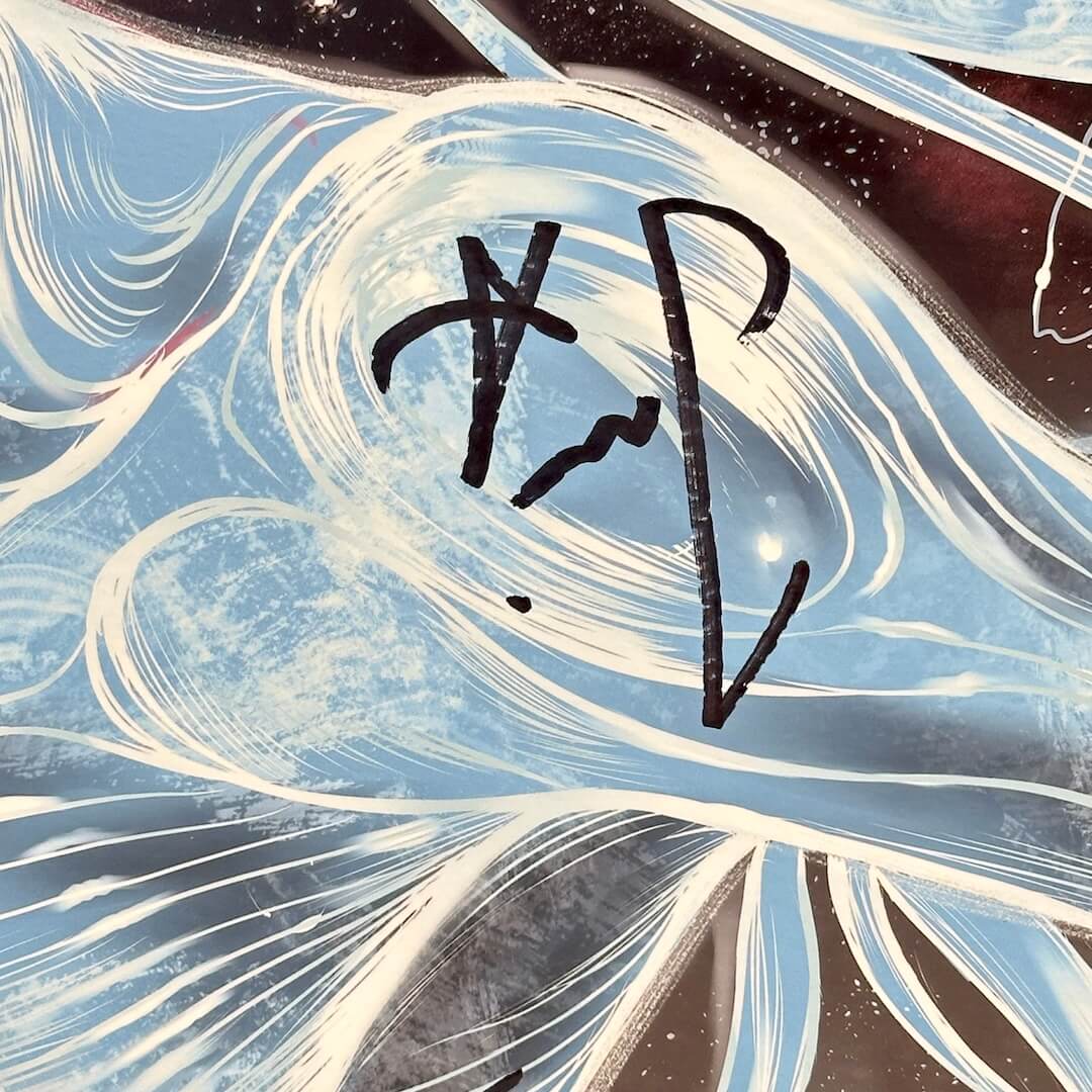 close up of marker signature detail on front of poster towards right side, on shoulder of large blue being.