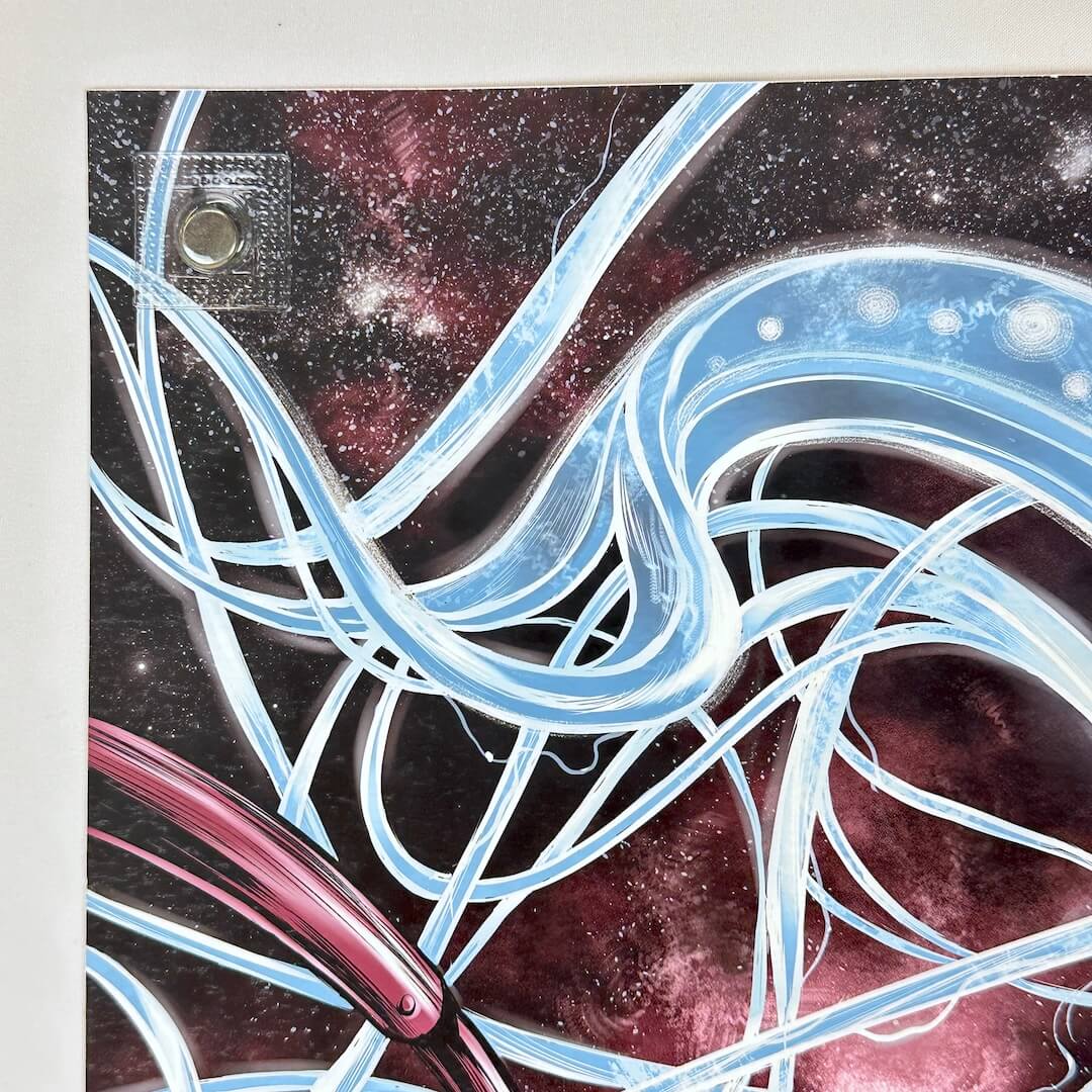 Top left corner of poster showing no damage to corner or edges.